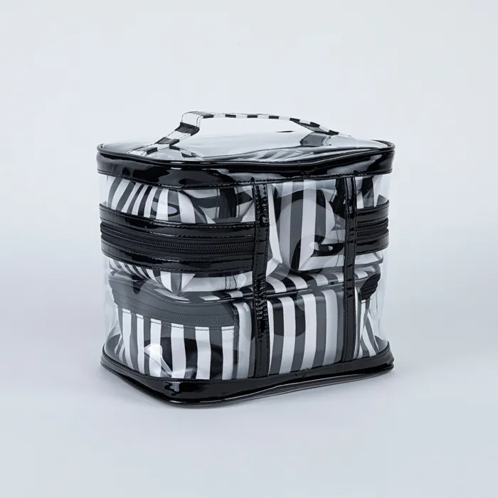 Millos Jet Set Go Collection Four Piece Jet Set Toiletry and Cosmetic Bag Set Earrings