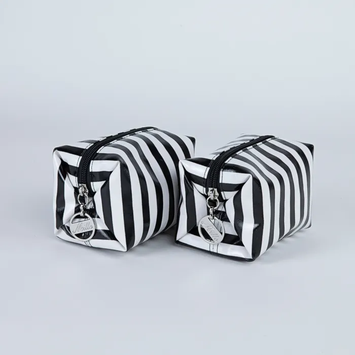 Millos Jet Set Go Collection Four Piece Jet Set Toiletry and Cosmetic Bag Set Earrings