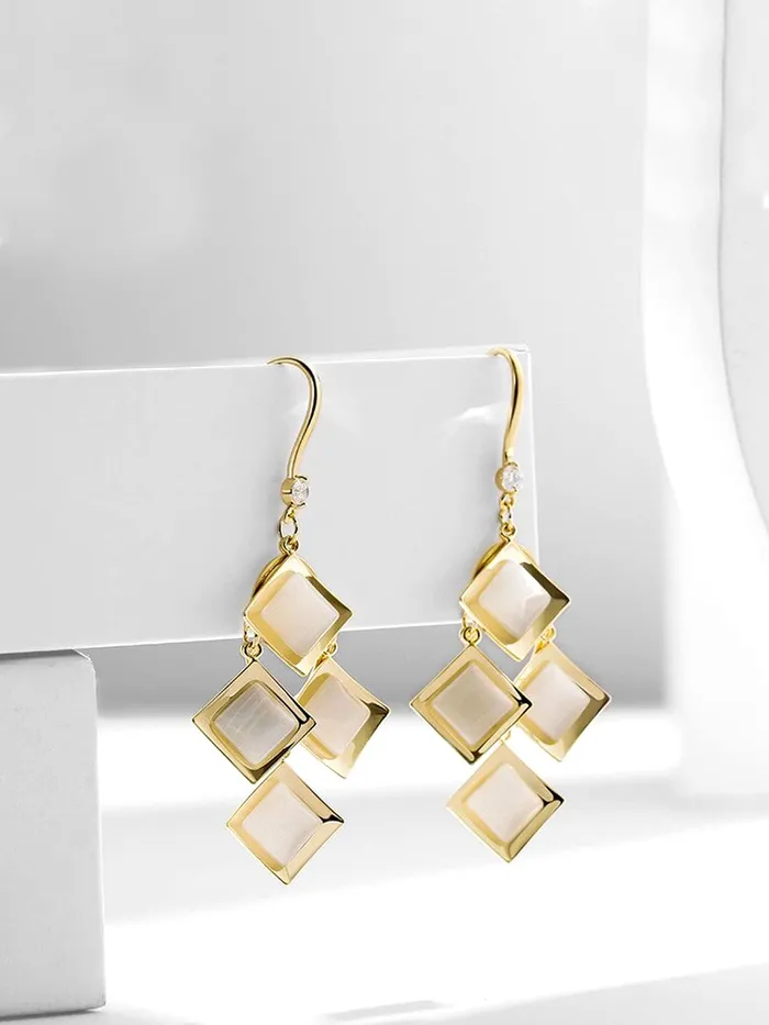 Necklaces Yellow Chimes Yellow Chimes Earrings For Women White Color Crystal Studded Geometrical Shape Drop Earrings For Women and Girls