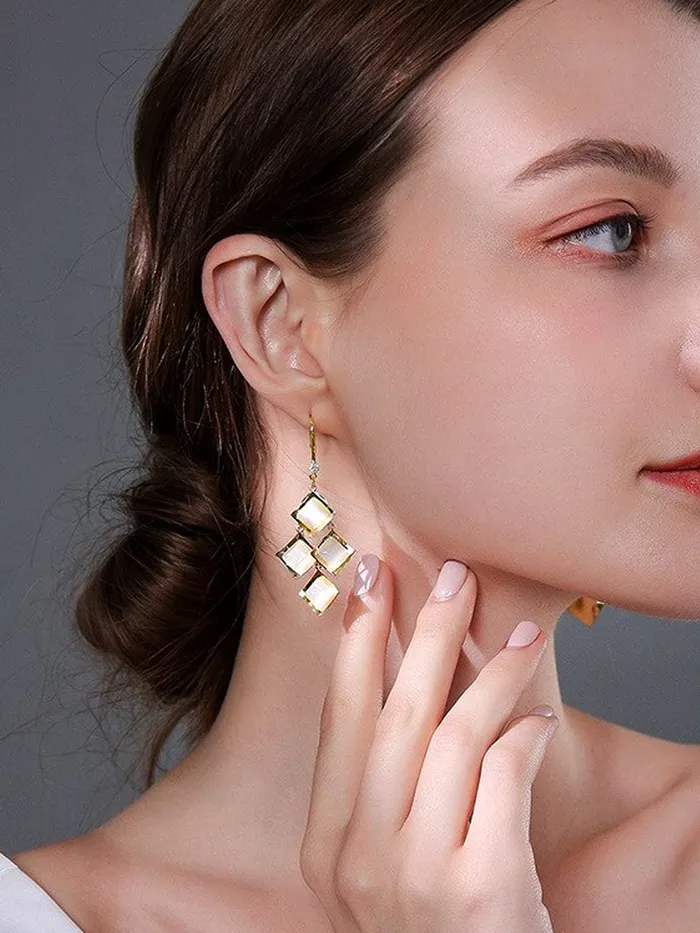 Necklaces Yellow Chimes Yellow Chimes Earrings For Women White Color Crystal Studded Geometrical Shape Drop Earrings For Women and Girls