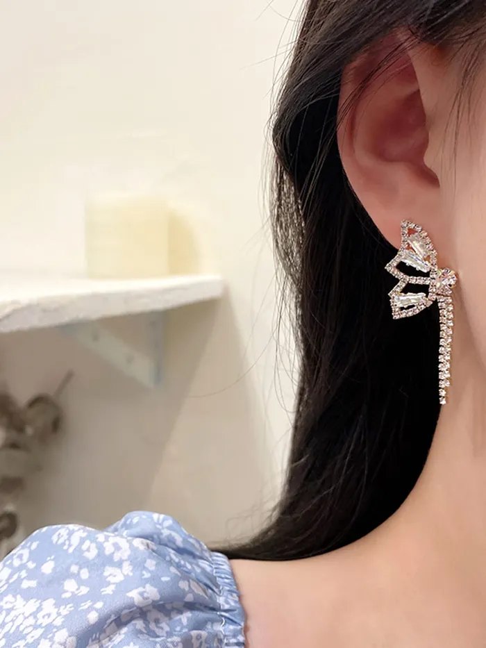 Yellow Chimes Earrings For Women Gold Tone Sparkling Crystal Studded Butterfly Shaped Chain Tassel Hanging Drop Earrings For Women and Girls Yellow Chimes Bracelets