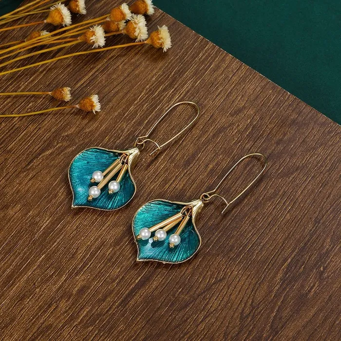 Yellow Chimes Earrings For Women Gold Toned Green Leaflet Designed Drop Earrings For Women and Girls Yellow Chimes Necklaces