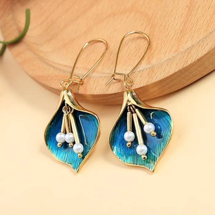 Yellow Chimes Earrings For Women Gold Toned Green Leaflet Designed Drop Earrings For Women and Girls Yellow Chimes Necklaces