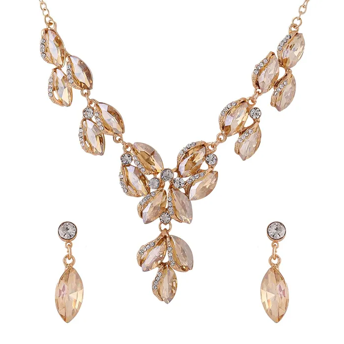 Yellow Chimes Earrings Yellow Chimes Jewellery Set For Women Gold Toned Oval Shaped Crystal Studded Necklace Set With Earring For Women and Girls Yellow Chimes Earrings Yellow Chimes Jewellery Set For Women Gold Toned Oval Shaped Crystal Studded Necklace Set With Earring For Women and Girls