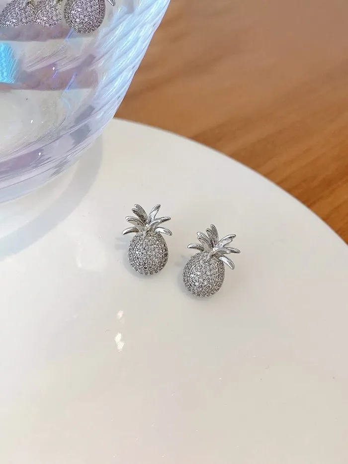 Yellow Chimes Yellow Chimes Earrings For Women Silver Toned Crystal Studded Pineapple Fruit Shape Stud Earrings For Women and Girls Necklaces
