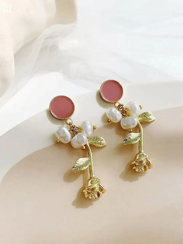 Yellow Chimes Yellow Chimes Latest Fashion Combo of 2 Pairs Gold Plated Crystal Pearl Heart Design Drop Earrings for Women and Girls Medium YCFJERCHRTRPLBNDL Bracelets