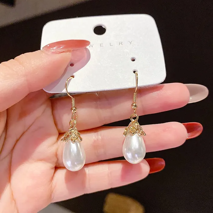 Yellow Chimes Yellow Chimes Latest Fashion Combo of 2 Pairs Gold Plated Crystal Pearl Heart Design Drop Earrings for Women and Girls Medium YCFJERCHRTRPLBNDL Bracelets
